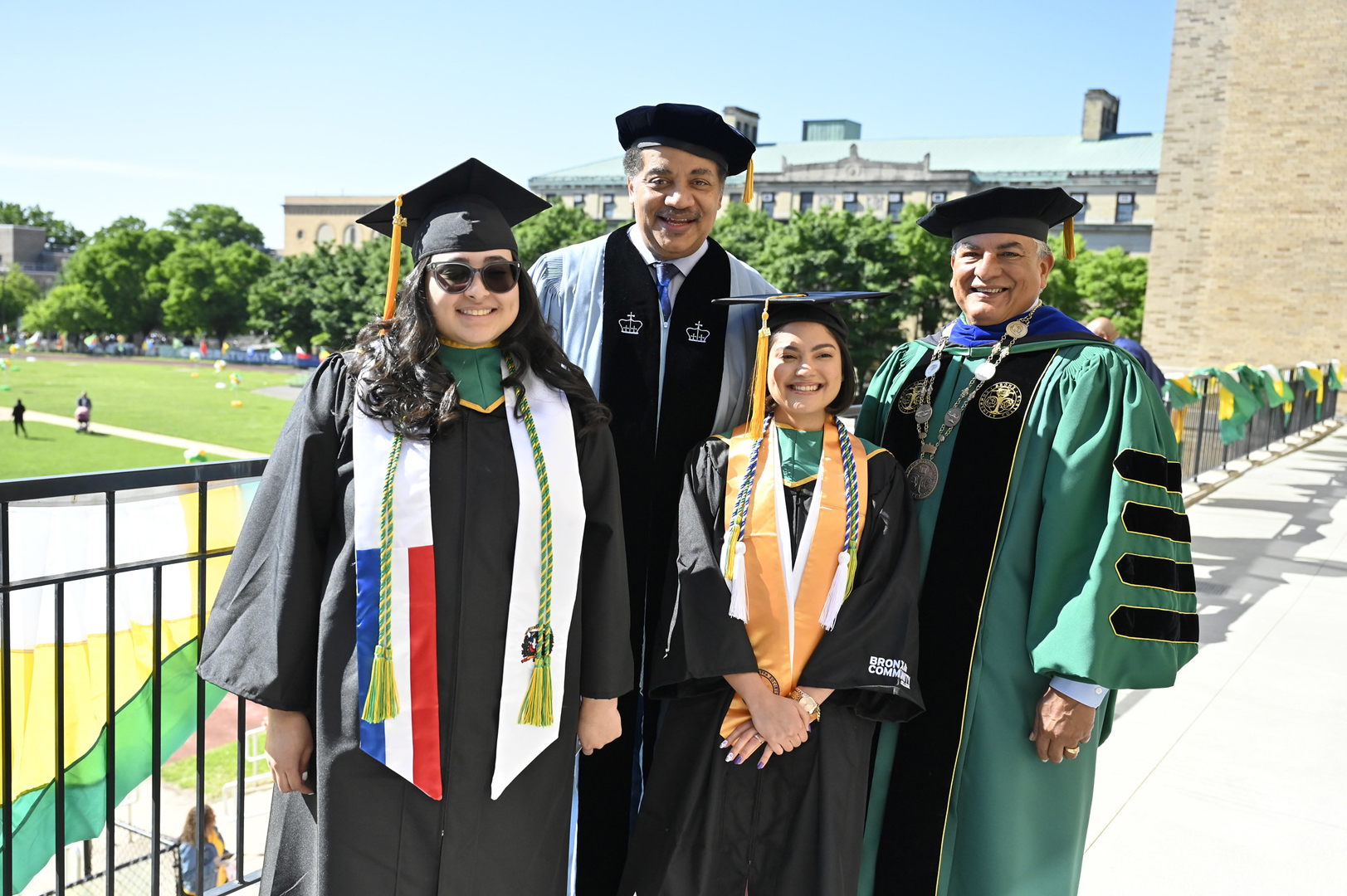 Dr. Neil deGrasse Tyson, BCC Interim President, Milton Santiago, Valedictorian, Veronica Urena and Salutatorian, Lia Calderon Castillo Dr. Neil deGrasse Tyson, BCC Interim President, Milton Santiago, Valedictorian, Veronica Urena and Salutatorian, Lia Calderon Castillo