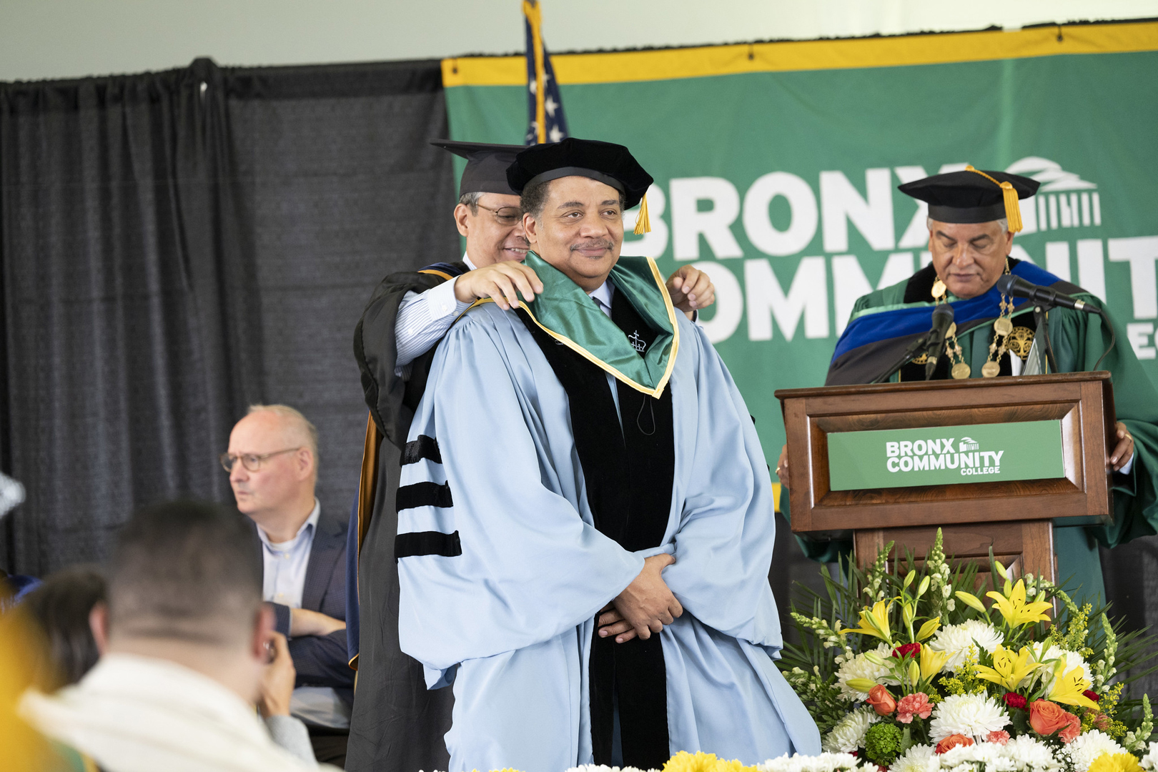 Dr. Luis Montenegro, Provost and Vice President for Academic Affairs and Interim President Milton Santiago conferring BCC's first honorary degree on Dr. Neil deGrasse Tyson Dr. Luis Montenegro, Provost and Vice President for Academic Affairs and Interim President Milton Santiago conferring BCC's first honorary degree on Dr. Neil deGrasse Tyson