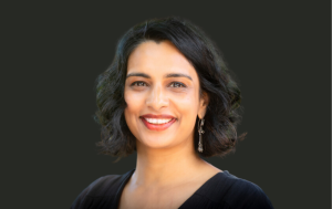 a photo of Dr. Prithi Kanakamedala smiling to the camera