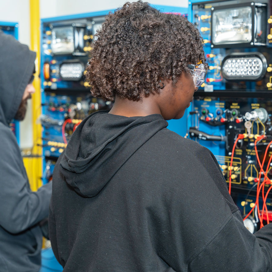 NYSOP page image - BCC students studying automotive technology.