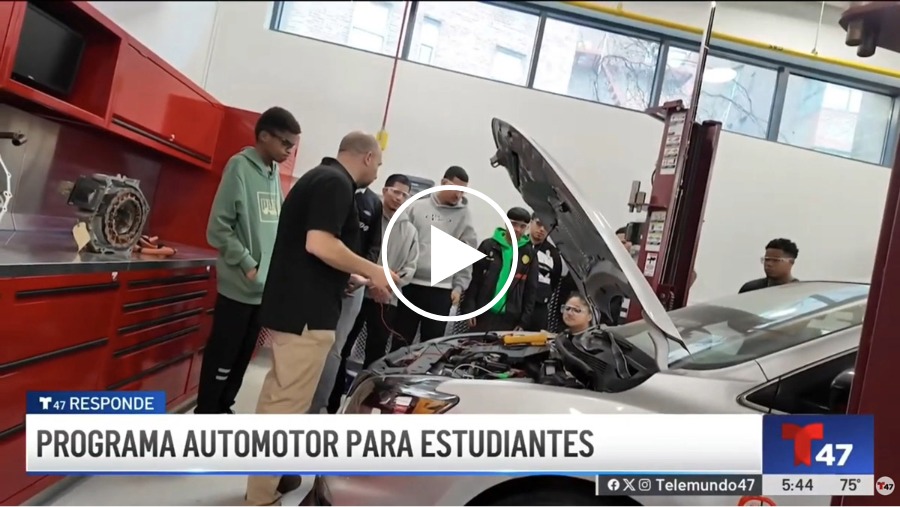 telemundo-playbutton_900w Telemundo Reports on the Bronx Community College Automotive Technology Program. Instructor and students stand in front of a vehicle with its hood up.
