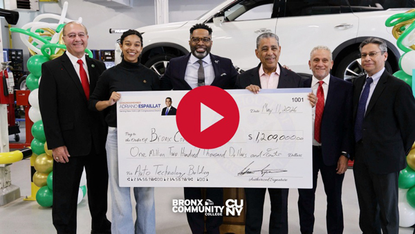 U.S. Representative Adriano Espaillat present check for federal funding to restore BCC's Auto Tech AAS building